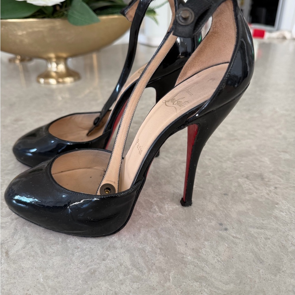 Christian Louboutin Black Patent T‑Strap Stiletto with Red Sole